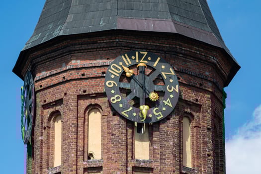 Clock tower of Konigsberg Cathedral. Brick Gothic-style monument in Kaliningrad, Russia. Immanuel Kant island. photo