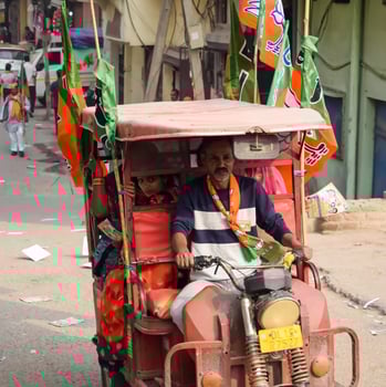 Delhi, India, December 02 2022 -Bharatiya Janata Party - BJP supporter during mega road show in support of BJP candidate Pankaj Luthara to file nomination papers ahead of MCD local body Elections 2022 photo