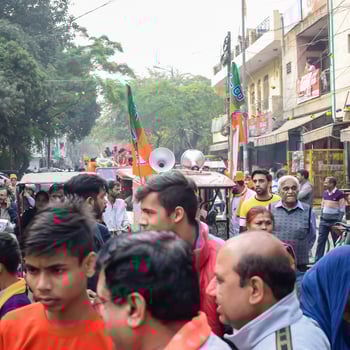 Delhi, India, December 02 2022 -Bharatiya Janata Party - BJP supporter during mega road show in support of BJP candidate Pankaj Luthara to file nomination papers ahead of MCD local body Elections 2022 photo