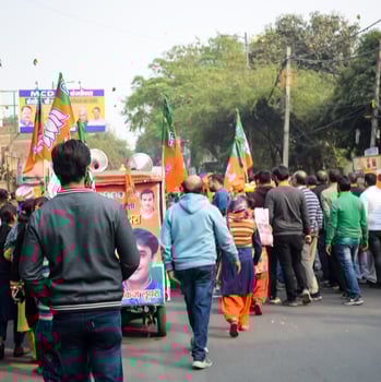 Delhi, India, December 02 2022 -Bharatiya Janata Party - BJP supporter during mega road show in support of BJP candidate Pankaj Luthara to file nomination papers ahead of MCD local body Elections 2022 photo