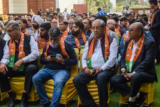 Delhi, India, December 02 2022 -Bharatiya Janata Party - BJP supporter during mega road show in support of BJP candidate Pankaj Luthara to file nomination papers ahead of MCD local body Elections 2022 photo