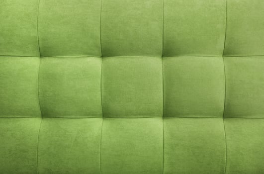Olive suede leather background, classic checkered pattern for furniture, wall, headboard photo