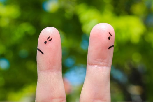 Finger art of couple. Couple after an argument looking in different directions. photo