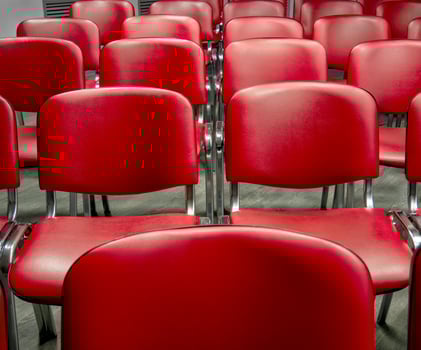 Seats in the audience for conference or presentation participants. Holding mass events. Classic empty chairs in a row photo