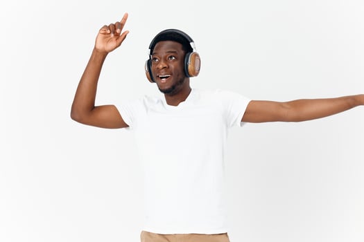 African man wearing headphones in white t-shirt music entertainment photo