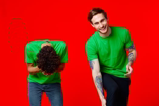 Cheerful friends laugh communication emotions red background photo