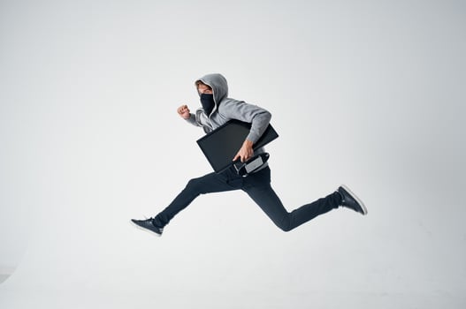 male thief crime anonymity caution balaclava isolated background photo
