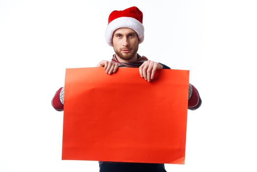 handsome man in a christmas hat with Red mockup poster copy-space studio photo