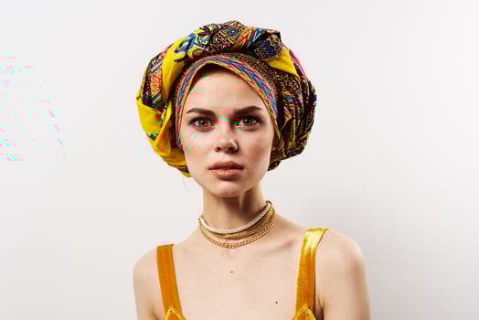 cheerful woman decoration multicolored turban ethnicity fashion studio photo