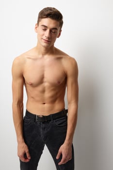 male naked muscled body black pants studio posing cuteness photo