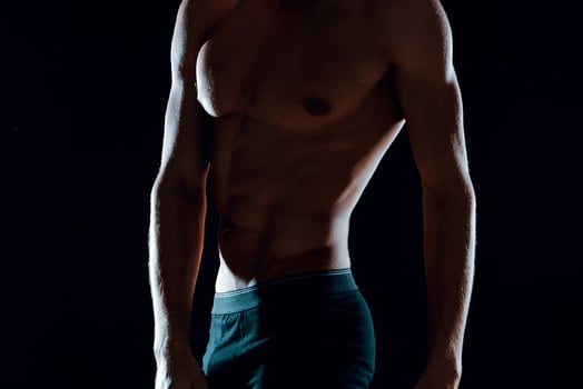 man in black panties muscled body workout gym photo
