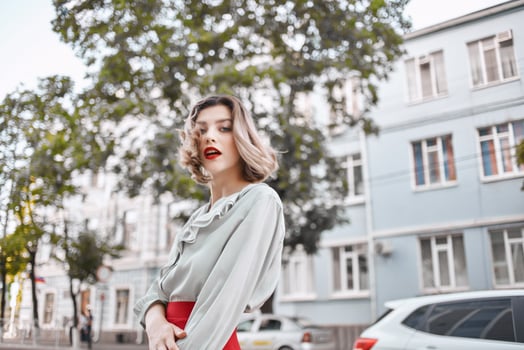 pretty woman outdoors red lips walk lifestyle posing photo