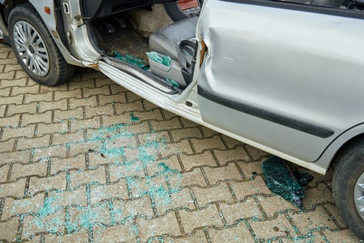 Crashed car after traffic accident on road photo
