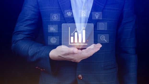 Big data analytics and business intelligence BI concept with chart and graph icons on digital screen interface and business people in the background. photo