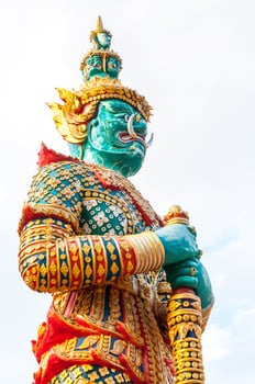 Giant statue  Wat Phra That Doi Kham at Chiang Mai,Thai temple Northern Thailand. photo