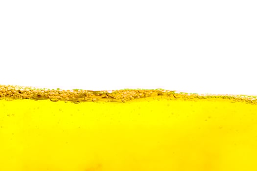 Beautiful wave of air bubble inside isolated on white background,yellow summer drink with bubbles,Beer bubbles photo