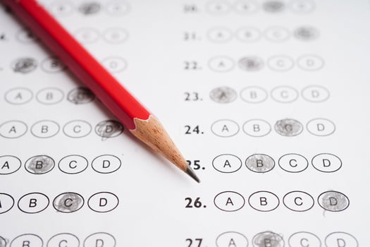 Answer sheets with pencil drawing fill to select choice, education concept. photo