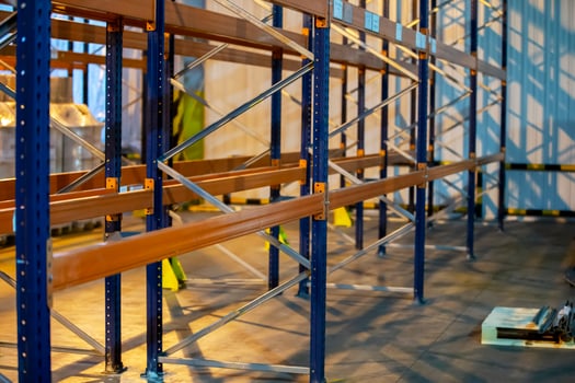 Metal structure of warehouse shelves for storing products. photo