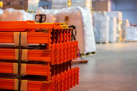 Stacked metal structure of warehouse shelves for storing products. photo