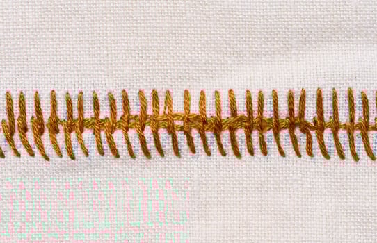 Piece of cotton fabric for making tablecloths and kitchen towels with embroidered elements photo