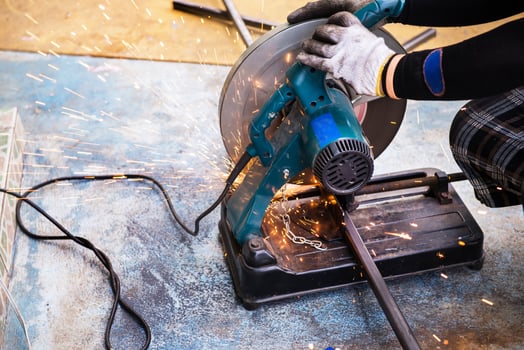 Metal cutting by cut off saw photo