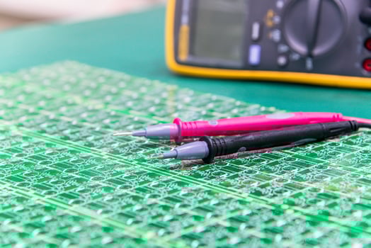 Digital multimeter on ESD table photo