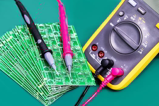 Digital multimeter on ESD table photo