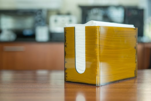 Orange box with napkin in coffee shop photo