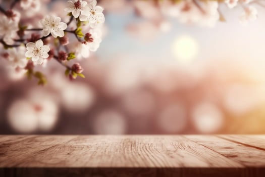 Wooden top table with spring cherry blossom and blur background. photo