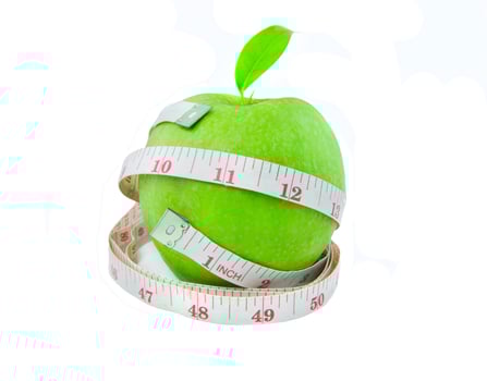 Fresh Green apple with Measuring tape on white background photo