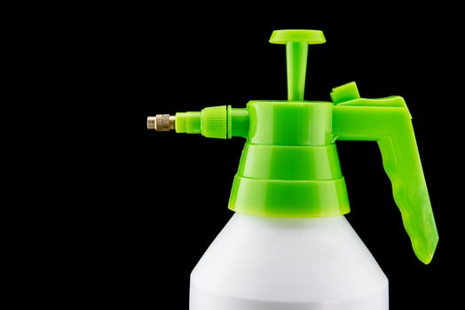 A white pump and spray bottle photo
