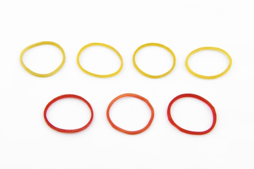 red and yellow plastic band photo