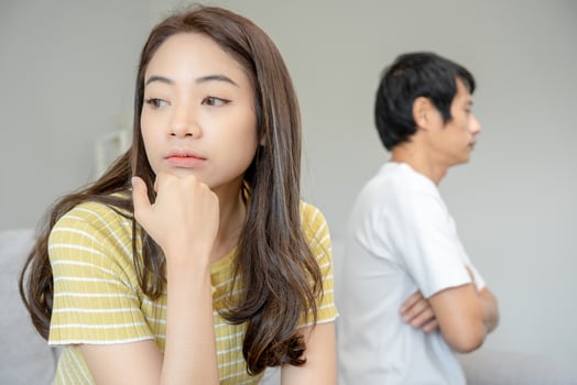 Divorce. Asian couples are desperate and disappointed after marriage. Husband and wife are sad, upset and frustrated after quarrels. distrust, love problems, betrayals. family problem, teenage love photo