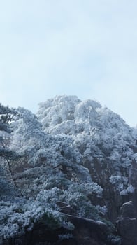 The beautiful frozen mountains view coverd by the white snow and ice in winter photo