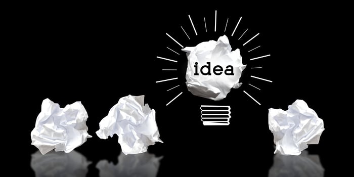 Light Bulbs Made with Crumpled Paper - Idea, Creativity Concept photo