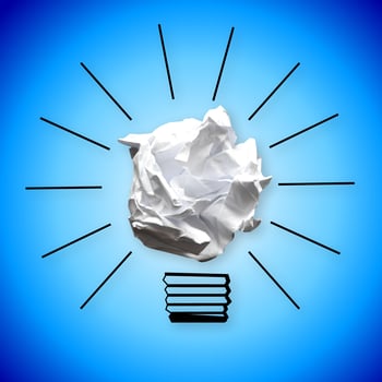 Light Bulb Icon Made with Crumpled Paper - Idea, Creativity Concept photo