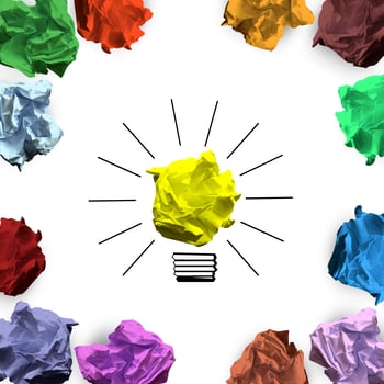 Light Bulb Icon and Colorful Crumpled Papers - Idea, Creativity Concept photo