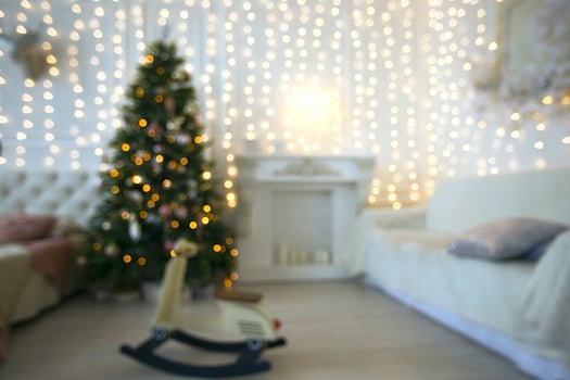 Blurred background of Christmas room with golden bokeh. photo