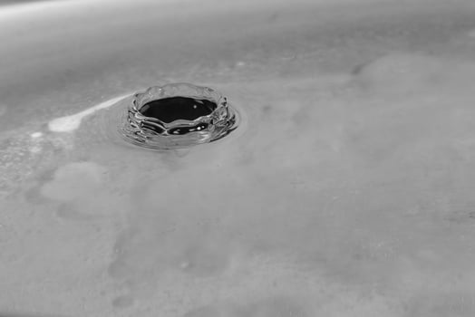 falling drops in water photo