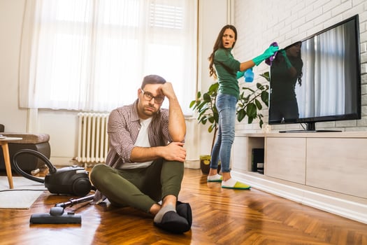 Young couple is cleaning their apartment photo