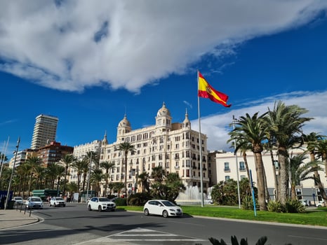 urban landscape from alicante to city center with spanish flag photo