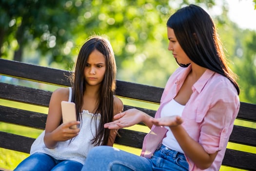 Mother and daughter spending time together at the park photo