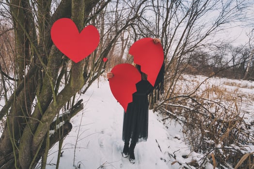 Heartbroken young blonde woman on the forest photo