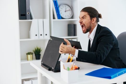 businessmen emotions work office desk boss photo
