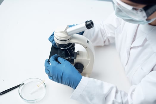 woman wearing medical mask laboratory microscope science research photo