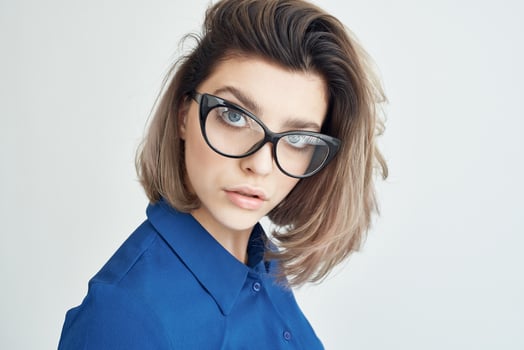 Business woman wearing glasses blue shirt fashion elegant style photo