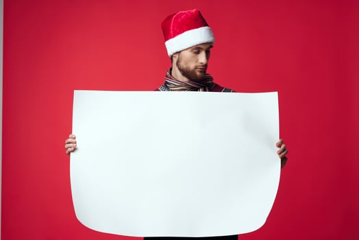 handsome man in a christmas white mockup poster isolated background photo