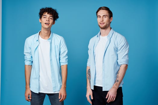 good friends in shirts on a blue background communication greeting party photo