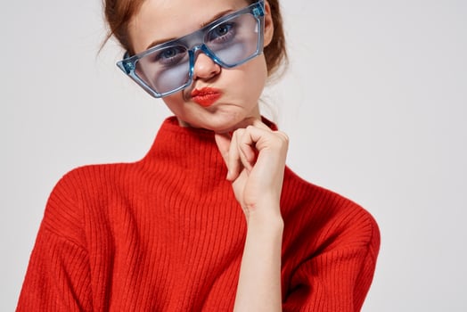 beautiful woman modern style sunglasses light background photo