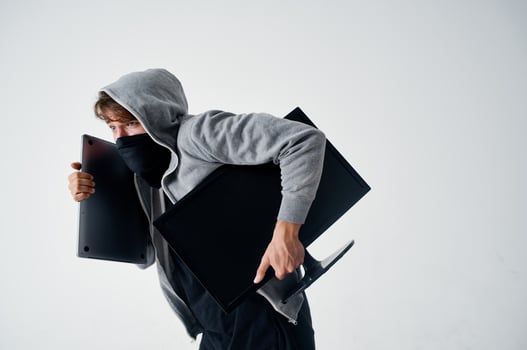 male thief crime anonymity caution balaclava light background photo